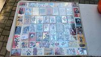 Full view of the framed 58 hockey cards collection including various player cards, rookies, and inserts.