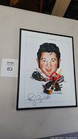 Front view of the framed caricature of Tony Esposito as a hockey goalie, signed by Tony Esposito.