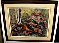 Frontal view of signed abstract oil painting in wooden frame