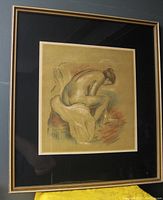 Full view of framed Renoir nude print with black mat and gold-edged frame reflecting some light glare.