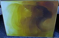 Full front view showing three overlapping female profiles in yellow-to-brown gradient