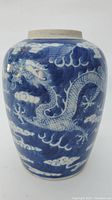 Front view of vase showing dragon and cloud motif
