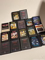 All 17 Atari 400/800 game cartridges arranged showing cover labels and titles in varied angles.