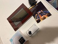 Kodak digital picture frame, Kodak EasyShare digital camera and user manual, Dodow sleep aid device boxed