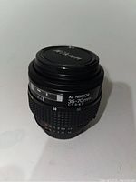 Front view of Nikon AF Nikkor 35-70mm f/3.3-4.5 lens showing focal length and aperture details.