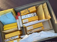 Top view of all vintage slide and photo storage boxes with various labels