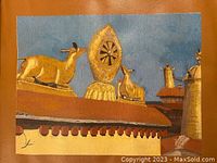 Canvas print image showing golden statues of deer and a large wheel structure on Johkang Temple roof with blue sky background.