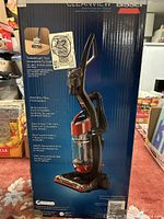 Original box for BISSELL CleanView vacuum showing vacuum image and TurboBrush tool feature