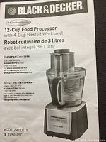 Box front and top showing Black & Decker branding, product image, model FP5050SC, and details about 12-cup capacity and 4-cup nested bowl.