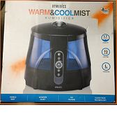 Front view of the humidifier packaging showing the product image and key features: 1.7 gallon capacity, 72 hour run time, suitable for large rooms, running whisper quiet with visible mist, no filters needed, and Clean Tank Technology.