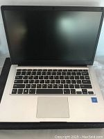 MSI laptop showing screen, keyboard, and touchpad