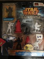 Front view of Star Wars Command Galactic Empire figure set in blister pack. Shows 9 figures including Emperor Palpatine and stormtroopers, sealed and new.
