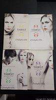 Top-down view of all four books in the "Thirst" series by Christopher Pike, arranged in a grid with covers visible. Each book cover shows monochrome styled photographic portraits of young individuals.