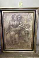 Full view of framed sepia-tone print depicting Virgin and Child with St. Anne and St. John the Baptist in detailed Renaissance style
