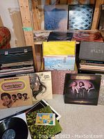 Assorted vinyl LPs displayed in a box and front selection