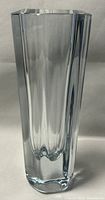 Front view of clear thick hexagonal glass vase showing clean lines and polished surface.