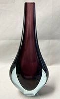 Front view of the tall Sommerso Murano vase with deep purple inner glass and clear outer layer.