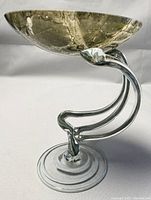 Side view showing marbled dish and tripod pedestal loops