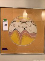 Front view of framed lithograph showing circular pastel design and frame condition