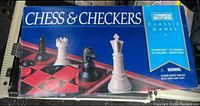 Sealed box of vintage Cardinal Brothers Chess & Checkers classic games set with image of chess pieces on board and list of contents.