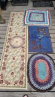 All 5 rugs and mats displayed together, showing designs and sizes