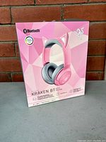 Front view of Razer Kraken BT Kitty Edition wireless Bluetooth headset box in pink color showing product image with kitty ears and branding.