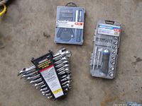 Lot of three hand tool sets: combination wrenches, precision screwdriver set, driver set with sockets.