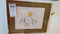 Full front view of framed print showing colorful abstract figures and sun motif with label and size notes.