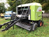 Front side view showing pickup tines, chamber housing, and overall condition