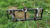 Front view of steel frame and spear
