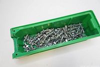 Green storage container bin with stainless steel bolts and nuts inside, showing quantity and storage.