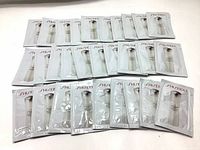 30 individual sachets of Shiseido IBUKI Softening Concentrate Lotion, neatly arranged showing front packaging