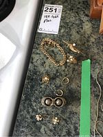 Overview of all jewelry pieces on countertop
