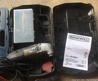 Rockwell SoniCrafter oscillating multi-tool, case with sanding attachments and manual