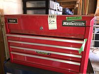 Front view of red Mastercraft toolbox with three drawers and top lid, showing dimensions 24x11x15.5