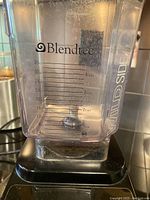 Close up photo of Blendtec WildSide blender container with clear plastic and measurement graduations up to 36 ounces or 4 cups.
