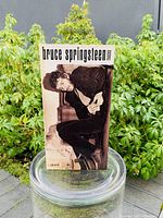 Front cover of the box set with photo of Bruce Springsteen in leather jacket