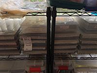 Overview of plastic bead organizers on wire shelving