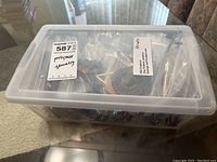 Closed clear plastic organizer box labeled 'polymer jewelry' with FED Creations sticker and quantity '30 ct'.