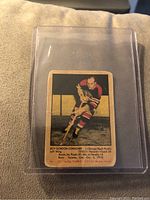 Front view of 1951-52 Parkhurst Roy Conacher hockey card showing player image, team uniform, and printed stats.
