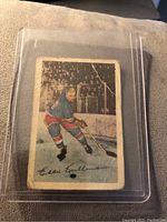 Front view of the 1952-53 Parkhurst Edward Kullman hockey card showing Edward Kullman skating with a hockey stick, numbered 18.