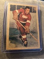Front of the 1953-54 Parkhurst hockey card showing Leonard 'Red' Kelly in Detroit Red Wings uniform with printed facsimile autograph.