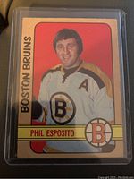 Front of the 1972-73 O.P.C. Phil Esposito hockey card featuring his portrait and team details.