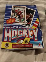 Front of the 1991-92 O-Pee-Chee Hockey wax box showing player cards and branding