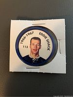 Front of the Eddie Shack hockey coin showing color photo of Eddie Shack, '1966-1967' dates, and number 113.