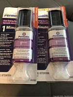 Photo of two unopened Permatex 1 Minute Fast Setting Epoxy tubes in blister pack