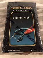 Front view of sealed Star Trek The Original Series card game booster box showing starship image and text 'BOOSTER PACKS'