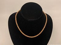 Full view of the 16-inch rope chain displayed on a black bust