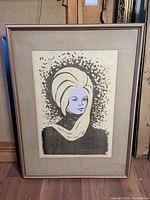 Full view of framed silkscreen portrait showing overall condition and frame wear.