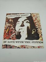 Front cover of the vinyl record featuring a close-up image of a man singing.